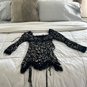 Selling this cute mini dress with Lace details on sleeve and neck